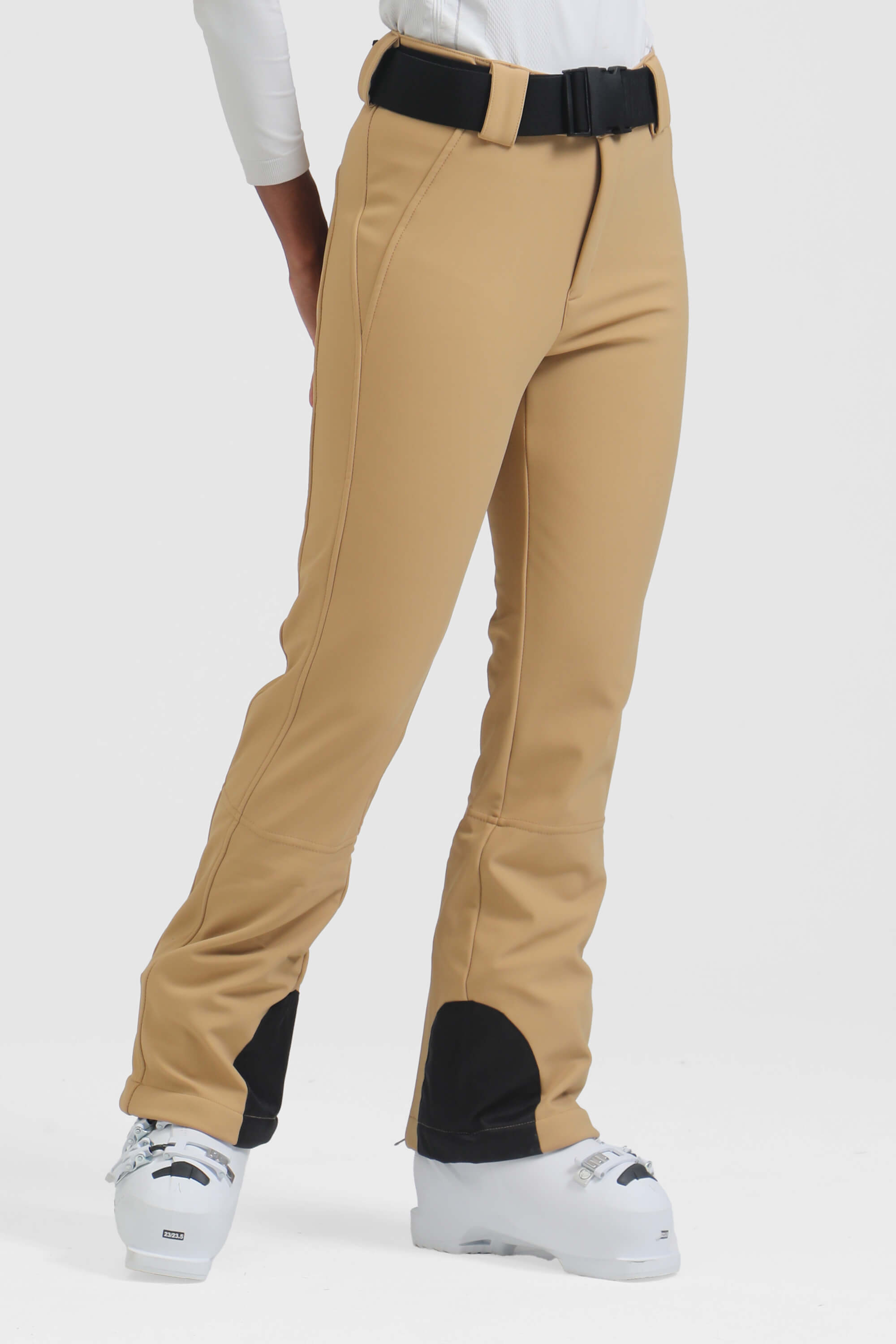 Women's black slim fit fleece-lined ski pants by Les Odettes, showing the fitted design and cozy fleece interior.