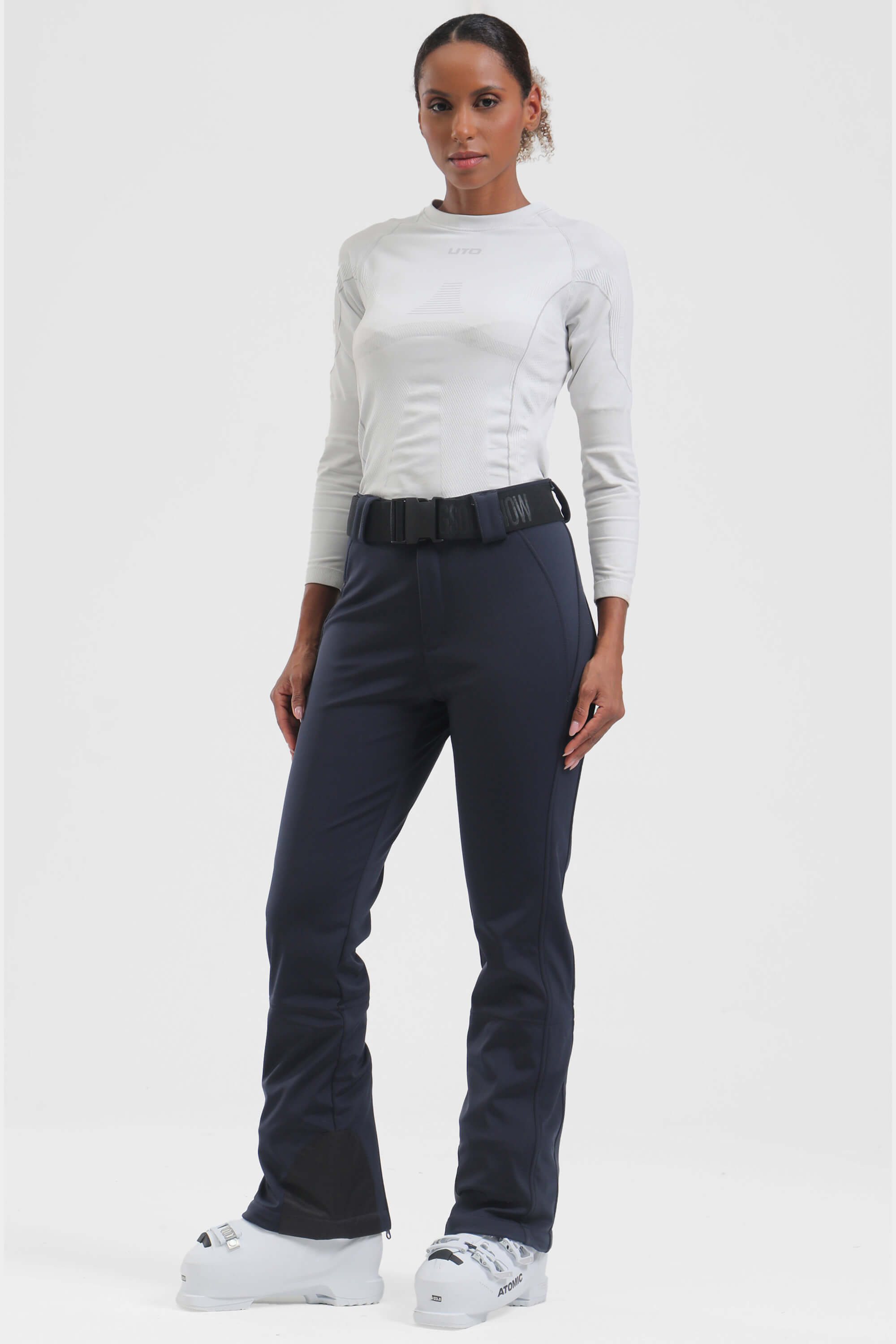 Women's black Les Odettes ski pants with slim fit, fleece-lined interior and wearable design for cold weather outdoor activities.