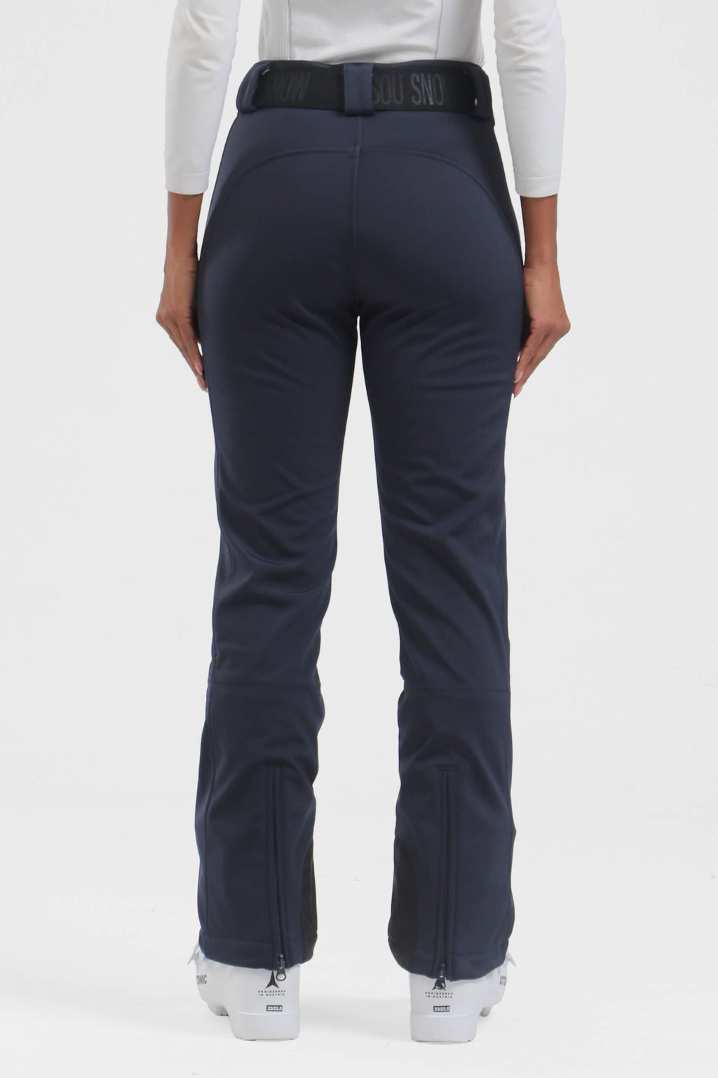 Women's black slim fit fleece-lined ski pants by Les Odettes, showing the fitted design and winter-ready fabric.