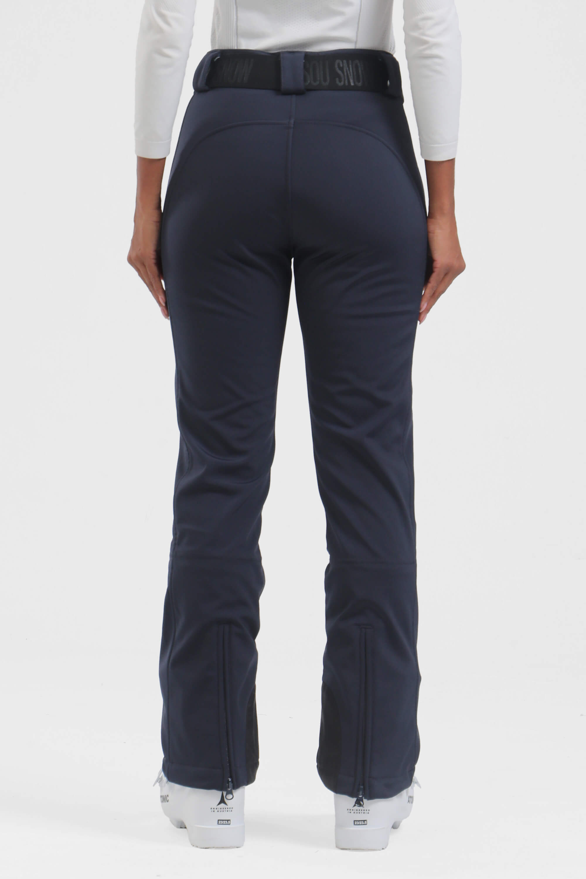 Women's black slim fit fleece-lined ski pants by Les Odettes, showing the fitted design and winter-ready fabric.