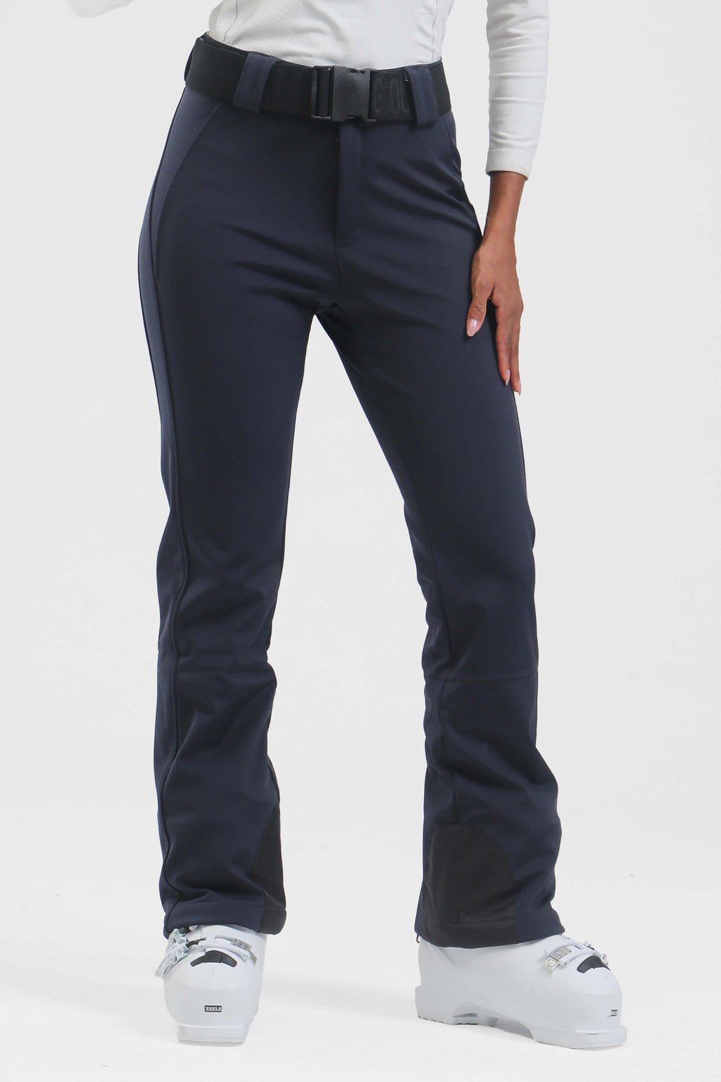 Women's black slim fit fleece-lined ski pants by Les Odettes, showing the close-up of the fabric and waistband details.