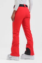 Women's black Les Odettes slim fit ski pants with fleece lining, designed for warmth and comfort during winter sports.