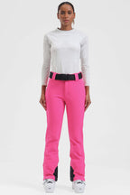 Women’s black wearable slim fit fleece-lined ski pants by Les Odettes, showing the close-up of the fitted waistband and fleece interior.