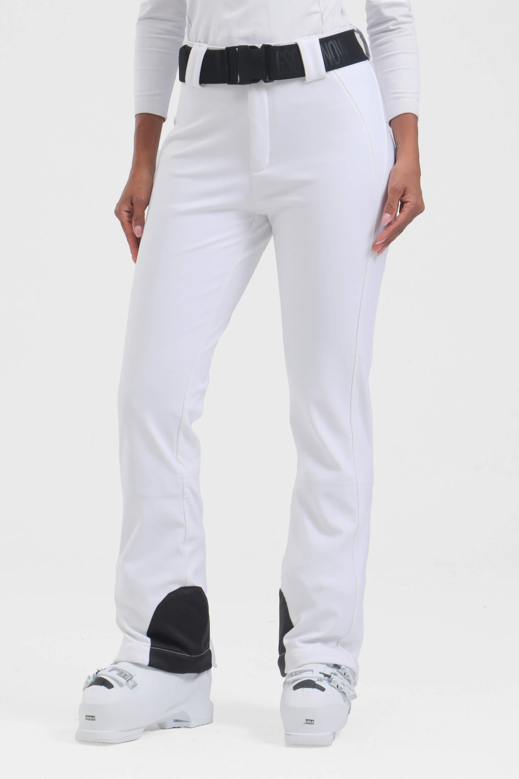 Women's black wearable slim fit fleece-lined ski pants by Les Odettes, showing the sleek design and cozy fleece interior.