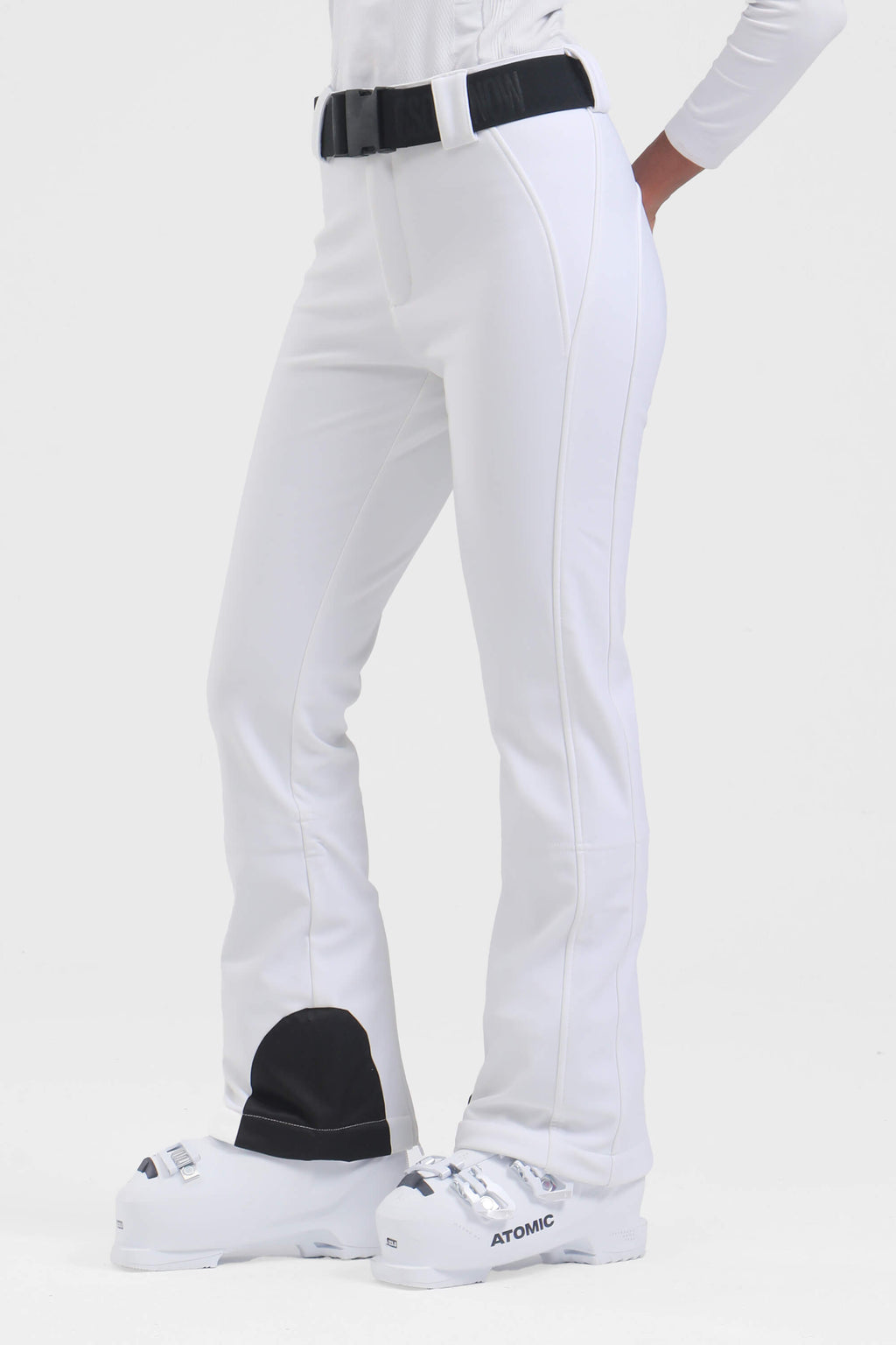 Women's black wearable slim fit fleece-lined ski pants by Les Odettes, showing the fitted design and cozy fleece interior.