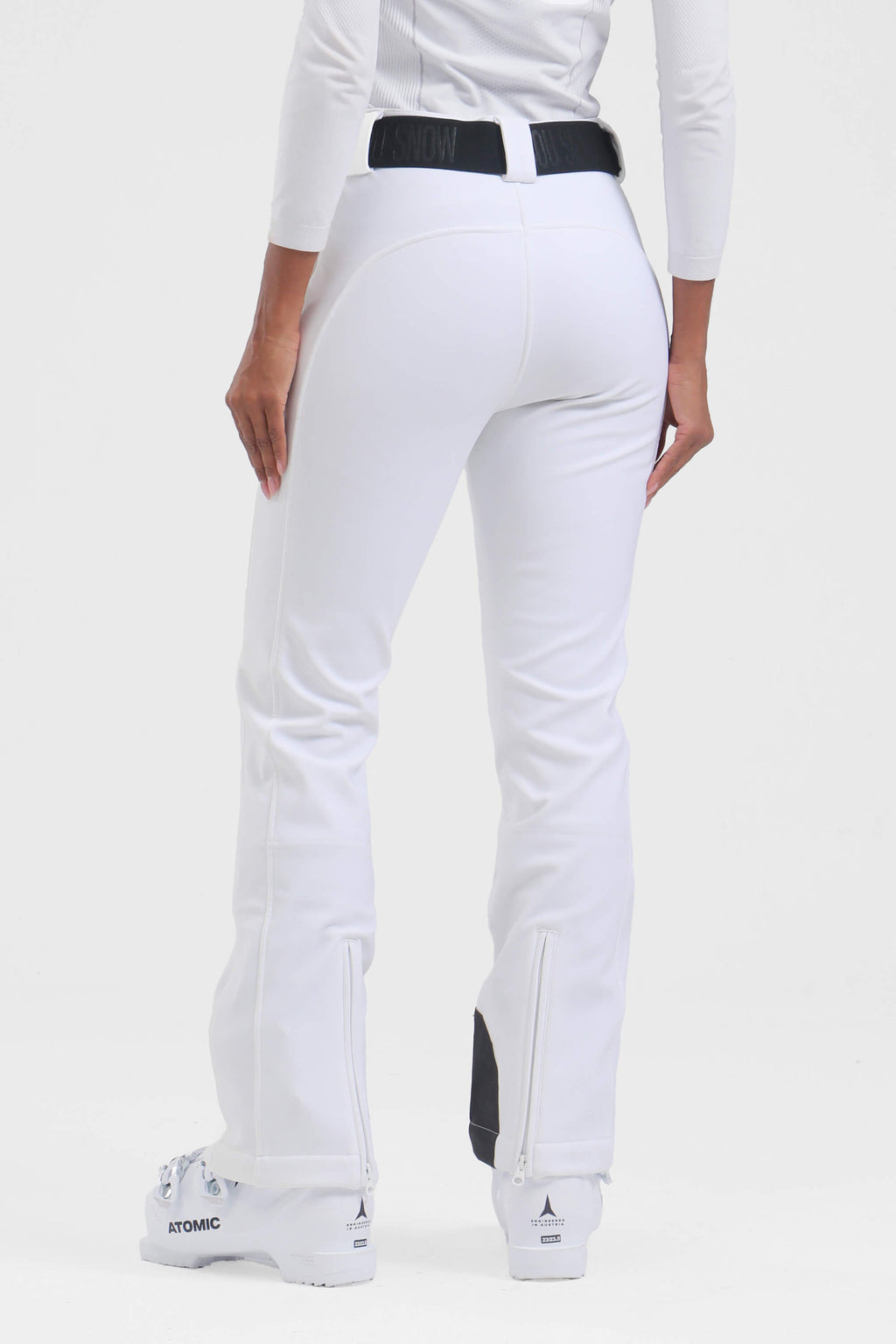 Women's black slim fit fleece-lined ski pants by Les Odettes, showcasing the sleek, fitted design and fleece interior for cold weather.