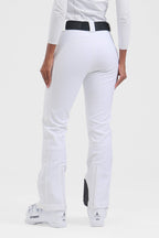 Women's black slim fit fleece-lined ski pants by Les Odettes, showcasing the sleek, fitted design and fleece interior for cold weather.
