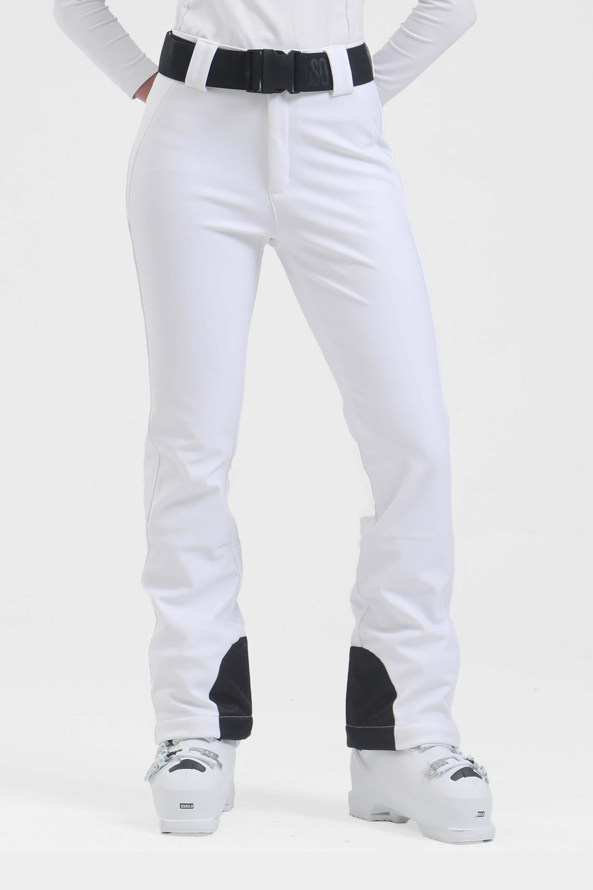 Women's black slim fit fleece-lined ski pants by Les Odettes, showing the fitted design and ski pant details.
