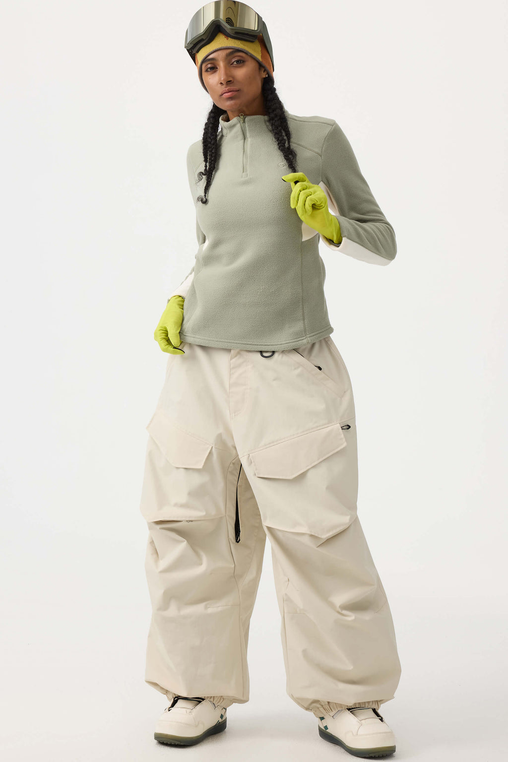 Women's black baggy utility snow pants by Les Odettes, showing durable, wear-resistant fabric and relaxed fit for winter outdoor activities.