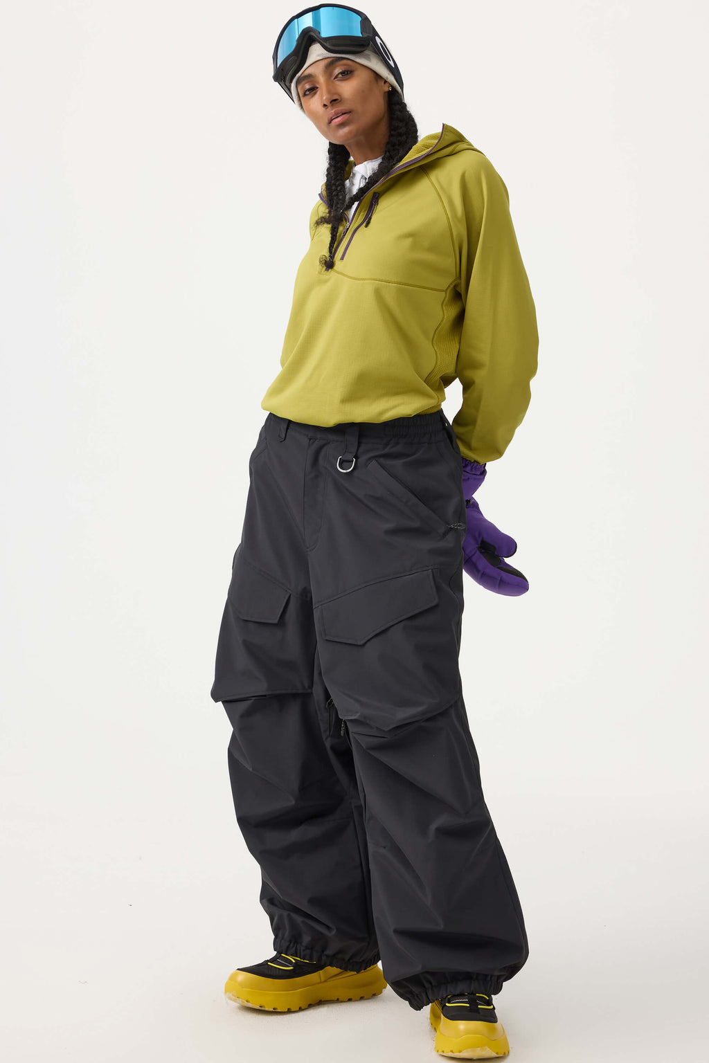 Women's black baggy utility snow pants by Les Odettes, durable wear-resistant fabric, designed for winter outdoor activities.