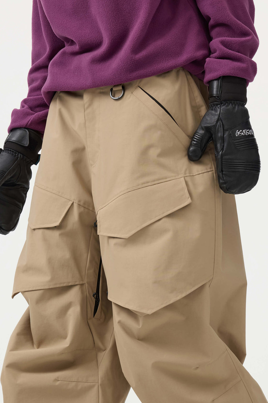 Women's black baggy utility snow pants by Les Odettes, durable, wear-resistant winter pants with a relaxed fit.