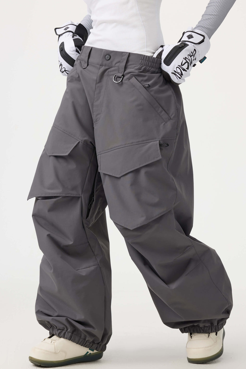 Women's black utility snow pants by Les Odettes with a relaxed fit, wear-resistant fabric, suitable for winter outdoor activities.