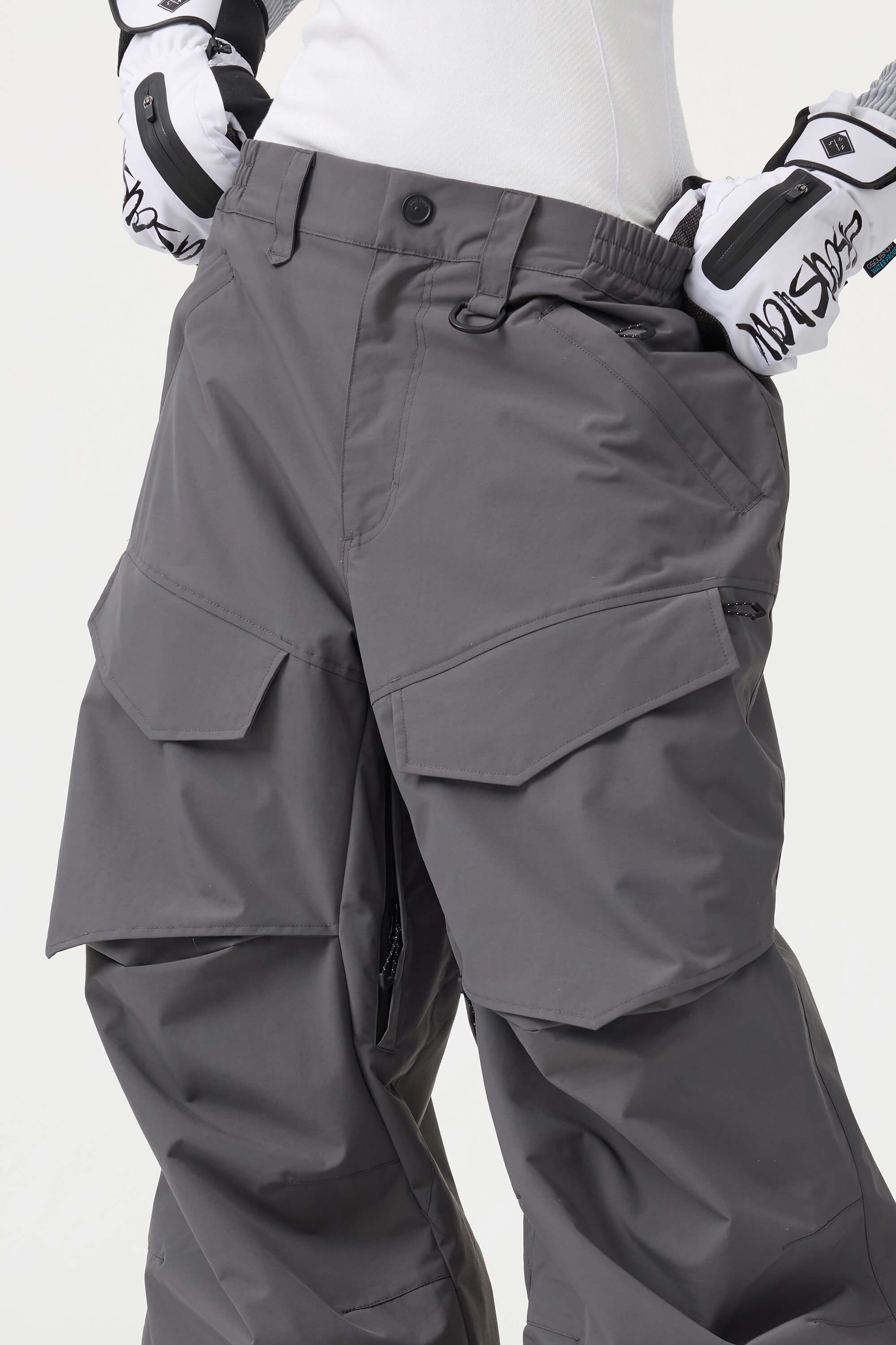 Women's black baggy utility snow pants by Les Odettes, with wear-resistant fabric and relaxed fit for winter outdoor activities.