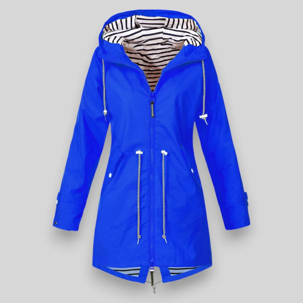 Noa™ waterproof jacket by Les Odettes, sleek coat with a fitted silhouette, shown on model in Stockholm setting.