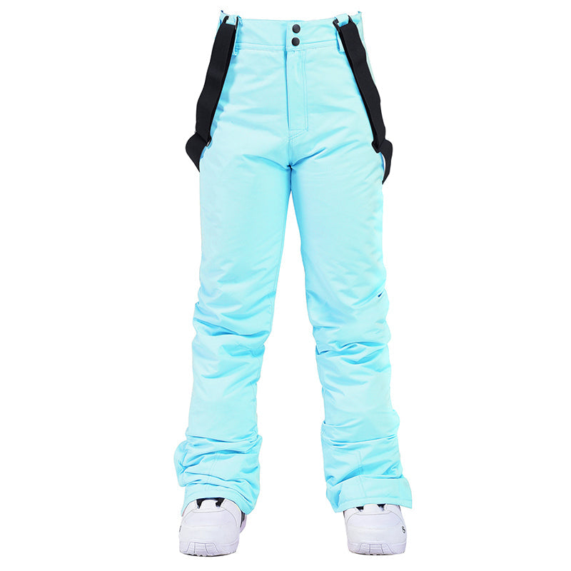 Women's insulated Les Odettes winter snow pants with mountain and Aurora ski bib design, suitable for cold weather snow activities.