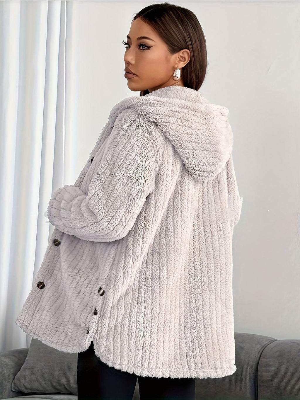 Kendall™ hooded cardigan by Les Odettes, featuring soft knit fabric, front pockets, and a cozy hood, shown in a neutral color.
