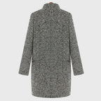 Les Odettes Herlie™ warm winter coat in cozy fabric, featuring a stylish design perfect for cold weather.