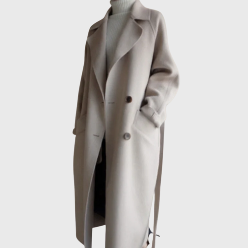 Longline Les Odettes Crizza™ overcoat displayed on a model, featuring a stylish, tailored design with a classic lapel collar.
