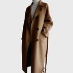 Longline Crizza™ overcoat by Les Odettes, shown in a stylish dark fabric with a tailored fit and classic collar detail.