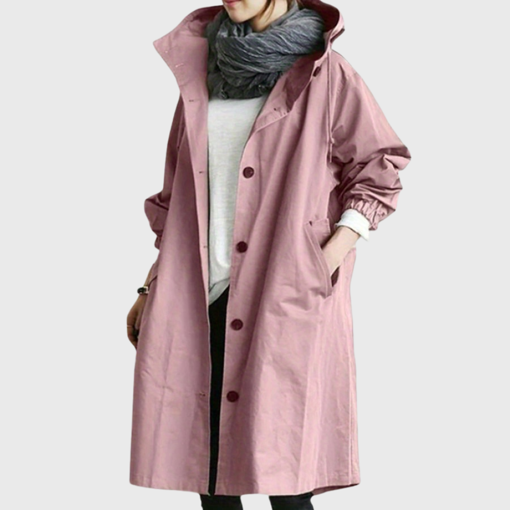 Les Odettes Arline™ waterproof trench coat in classic beige, featuring a double-breasted design and belt detail.