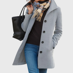 Kimmy™ longline coat by Les Odettes featuring a flattering silhouette and stylish design, shown on a model.