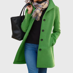 Kimmy™ longline coat by Les Odettes featuring a flattering silhouette, shown in a stylish, tailored design with a classic collar.