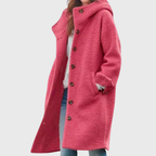 Les Odettes Crishna™ Warm Classic Coat shown in a cozy, stylish winter coat with a tailored fit and neutral color.
