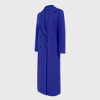 Longline winter trench coat by Les Odettes featuring a classic design and warm fabric, shown in a full-length image.