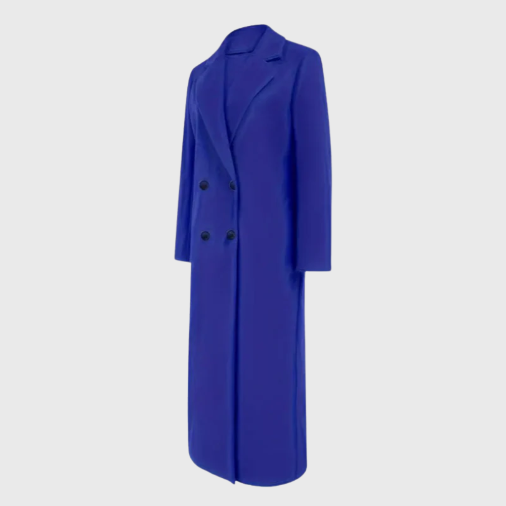 Longline winter trench coat by Les Odettes featuring a classic design and warm fabric, shown in a full-length image.