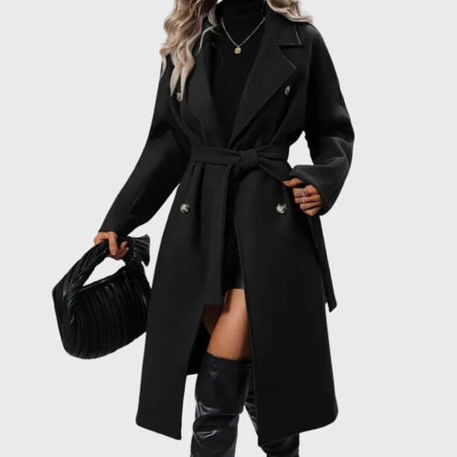 Les Odettes Bianca™ longline winter trench coat displayed on a model, showcasing a stylish, tailored outerwear piece.