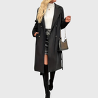Les Odettes Bianca™ longline winter trench coat displayed on a model, featuring classic double-breasted design and belted waist.