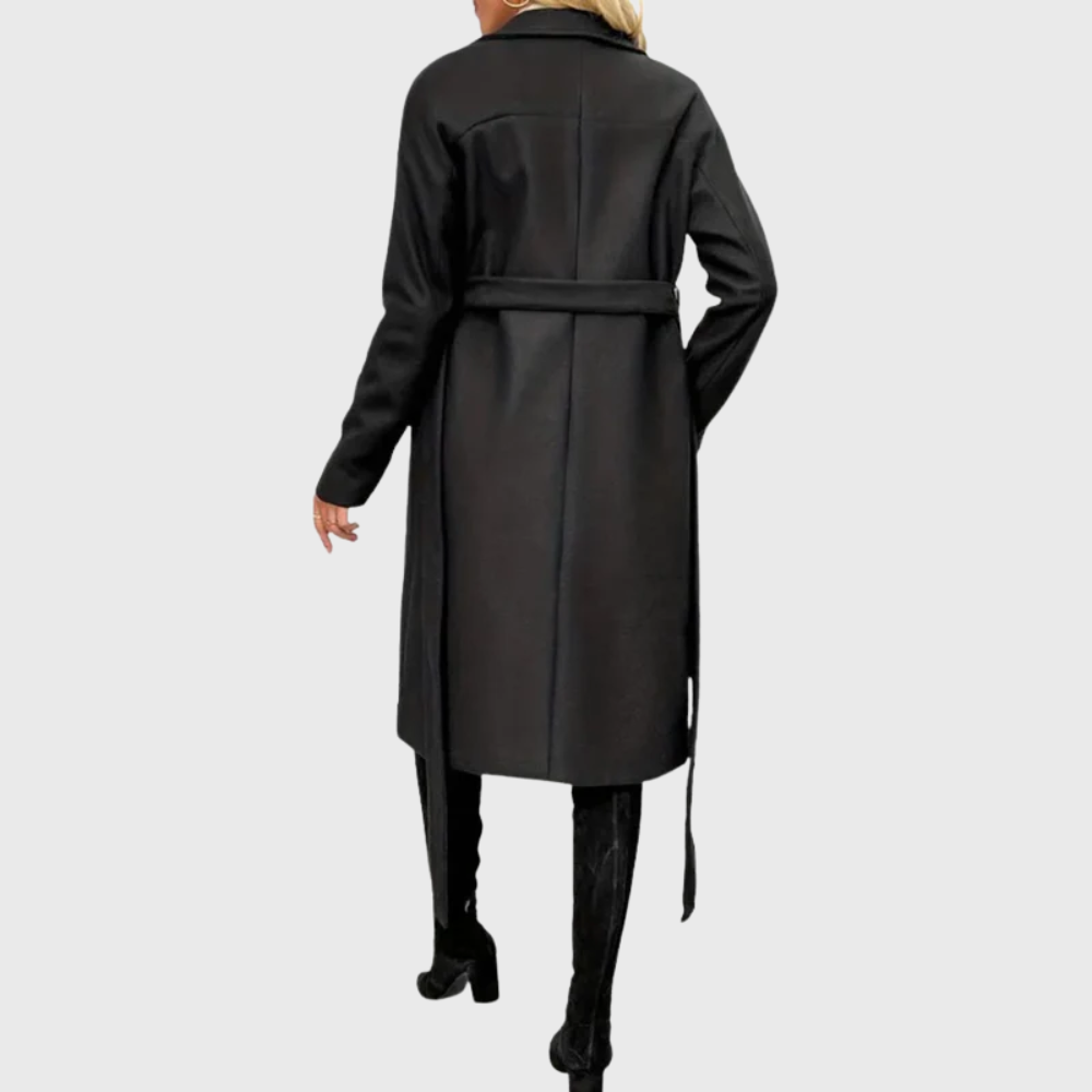 Longline Bianca™ winter trench coat by Les Odettes shown on a model, featuring classic double-breasted design and belted waist.