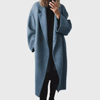 Elda™ Cosy Longline Overcoat by Les Odettes shown in a warm, stylish long overcoat with a tailored fit and soft fabric.