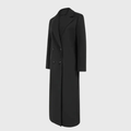 Longline winter trench coat by Les Odettes featuring a classic design, shown in black with button details and a belted waist.