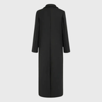 Longline winter trench coat by Les Odettes featuring a tailored fit, classic collar, and button closure, perfect for cold weather.