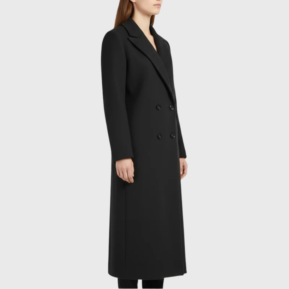 Longline winter trench coat by Les Odettes featuring a stylish, tailored design with a belt and classic collar.