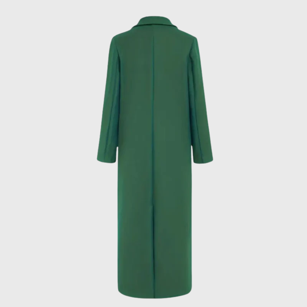 Longline winter trench coat by Les Odettes, featuring a stylish design with a belted waist and classic collar in a neutral color.