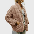 Hazel™ elegant jacket by Les Odettes, featuring a tailored fit with smooth fabric and stylish lapel design displayed on a mannequin.