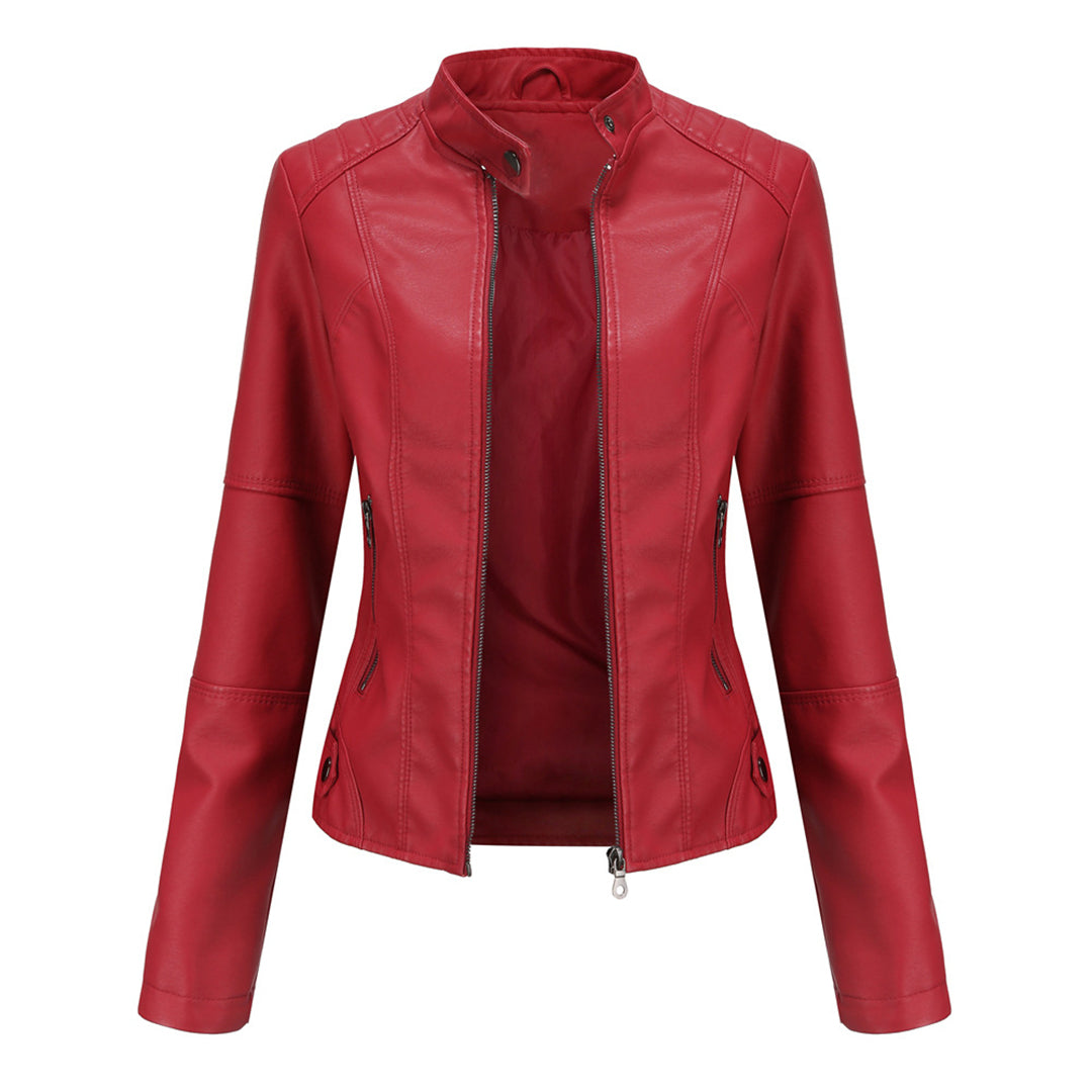 Les Odettes Zyra™ sleek red modern jacket with minimalist design, smooth fabric, and tailored fit displayed on a hanger.