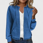 Elegant Olivia™ cardigan by Les Odettes, featuring a soft, stylish knit design, displayed on a neutral background.