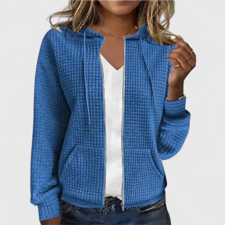 Elegant Olivia™ cardigan by Les Odettes, featuring a soft, stylish knit design, displayed on a neutral background.