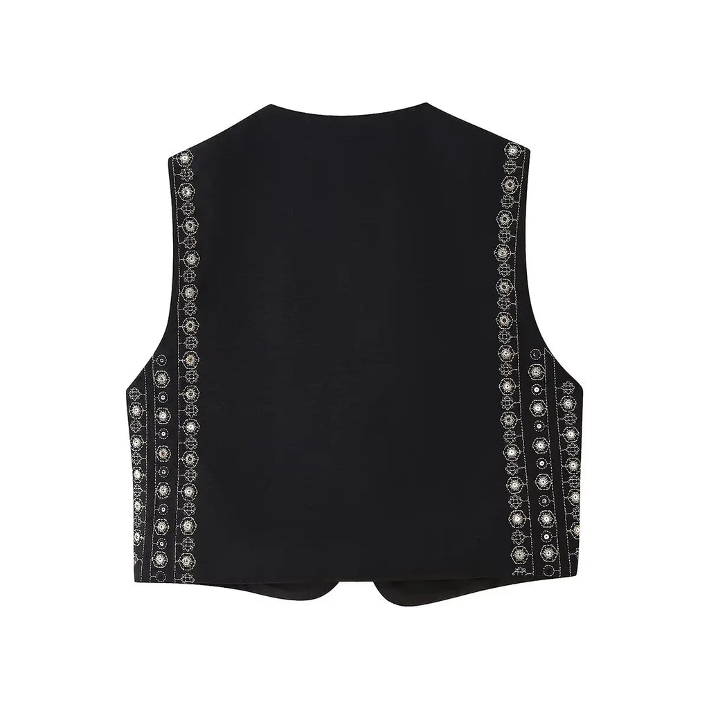 Les Odettes Celestia™ sequin pattern boho vest with vibrant, shimmering details and relaxed fit, perfect for casual or festival wear.