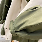 Aurelia™ Windbreaker Jacket by Les Odettes, lightweight black jacket with hood and zip front, designed for casual outdoor wear.