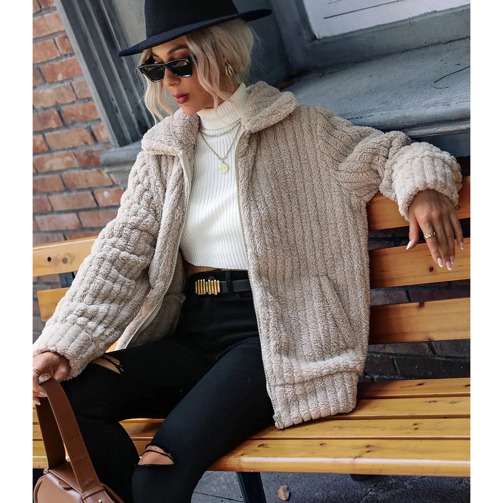 Elegant Ava™ jacket by Les Odettes, showcasing a stylish tailored design with a textured fabric and classic collar.
