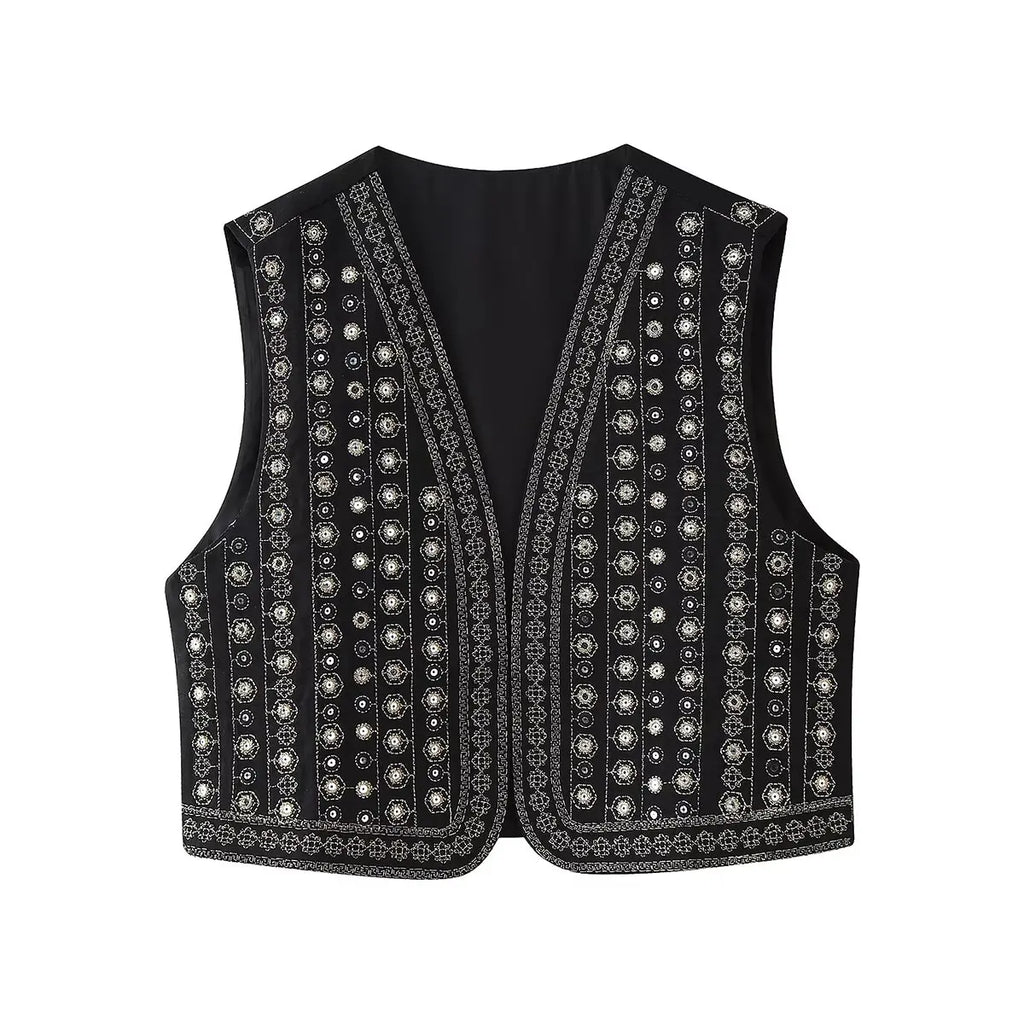 Les Odettes Celestia™ boho vest with sequin pattern, featuring a flowy, stylish sleeveless design and intricate embellishments.