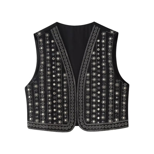 Les Odettes Celestia™ boho vest with sequin pattern, featuring a flowy, stylish sleeveless design and intricate embellishments.