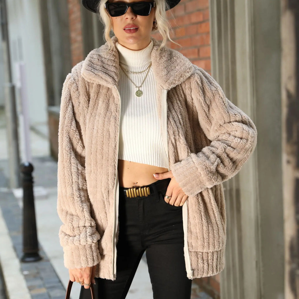 Elegant Ava™ jacket by Les Odettes, shown in a stylish, tailored design with a smooth fabric finish and classic collar.
