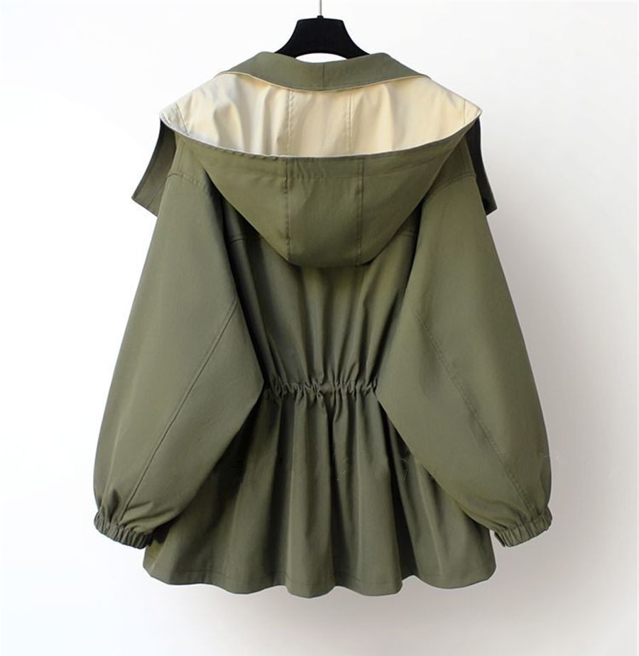 Aurelia™ windbreaker jacket by Les Odettes, lightweight black windbreaker with a hood and zipper, shown on a hanger.