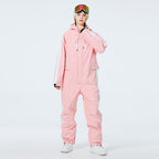 Les Odettes Women's AlpineChill SnowStorm one-piece snowsuit with a hood and winter insulation, designed for cold weather outdoor activities.