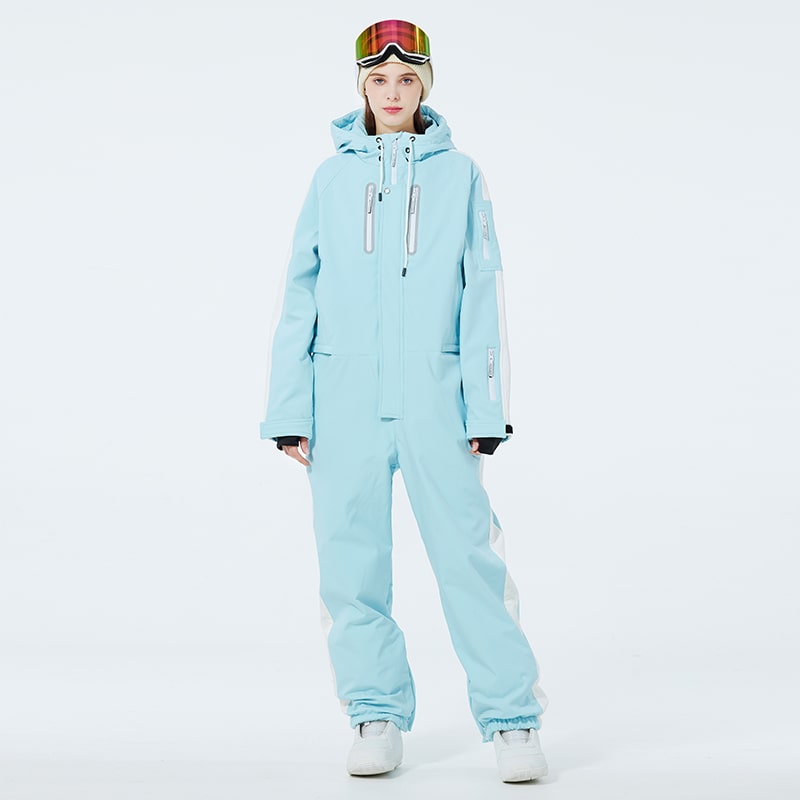 Les Odettes Women's AlpineChill SnowStorm one-piece snowsuit in navy with hood, insulated winter snow gear for women.